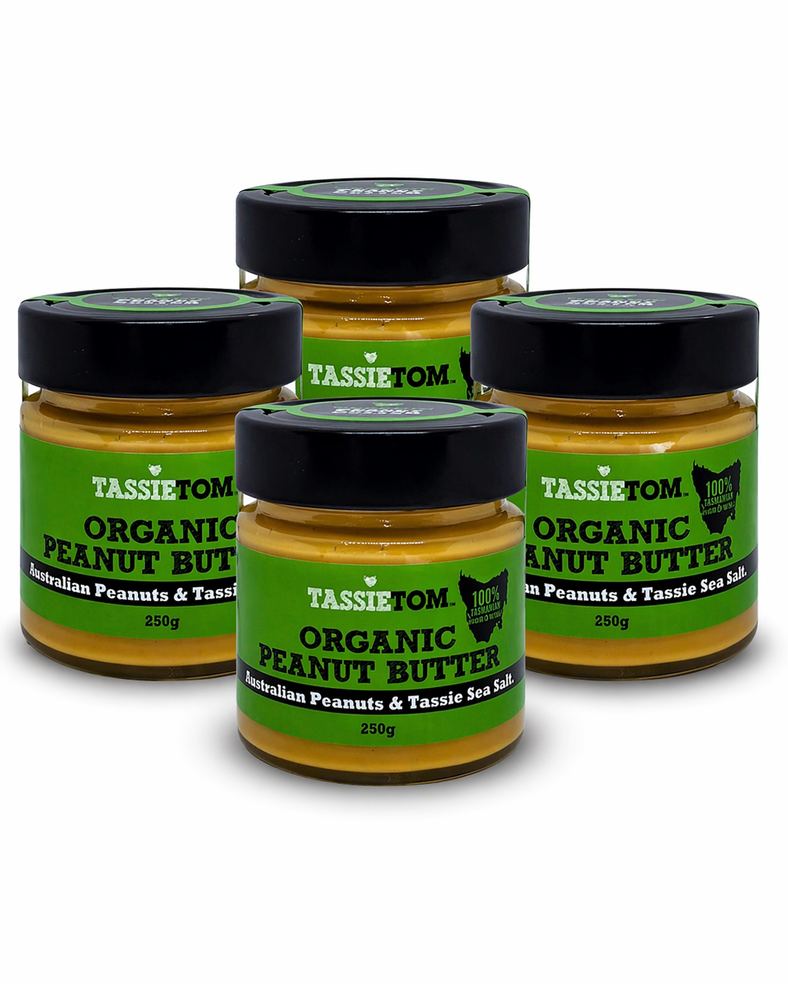 Four jars of TassieTom Organic Peanut Butter on a white background